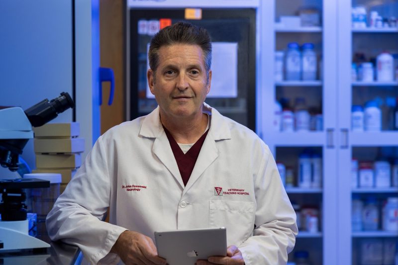 John Rossmeisl John Rossmeisl in a white lab coat in his lab.